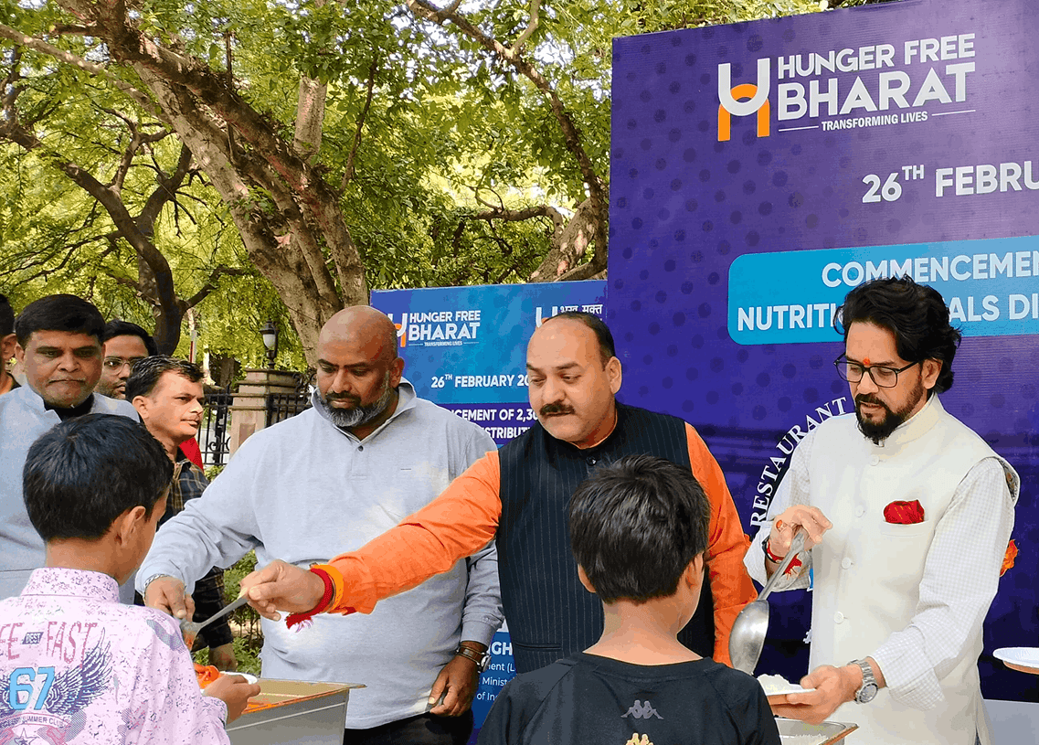 Commencement of 2,30,000 Nutritional Meals Distribution drive with dignitaries and volunteers serving children